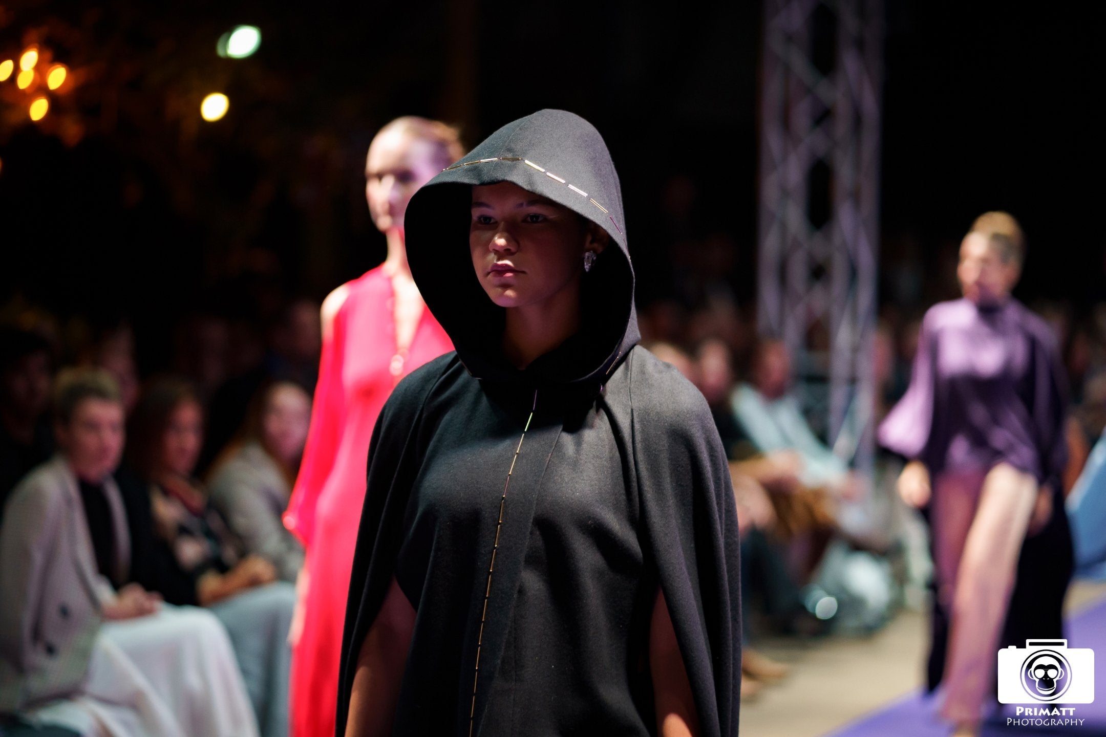 Full length black wool cape with golden crystal hem