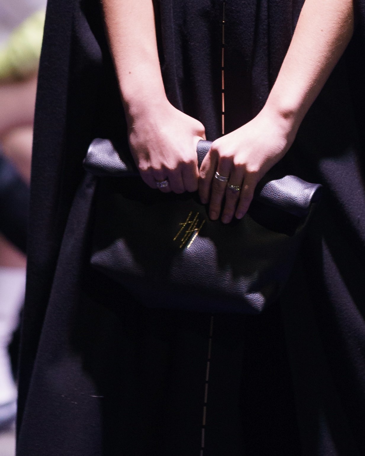 Black HH clutch with golden embroidery